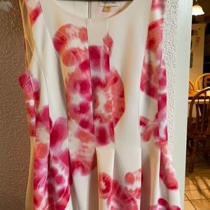 Calvin Kline dress with pleading and pockets.